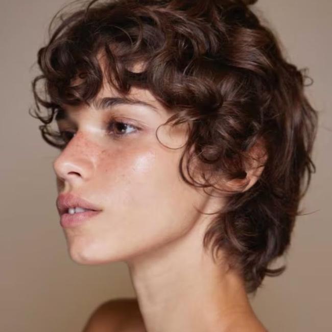 Bixie Haircut Model Boy Style en cabello rizado